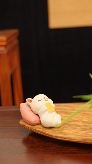 A cat dreaming of striking it rich handmade pottery figurine decor (tea pet) made by yixing purple clay