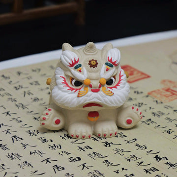 Yixing Zisha White Clay Sitting Guardian Lion Tea Pet