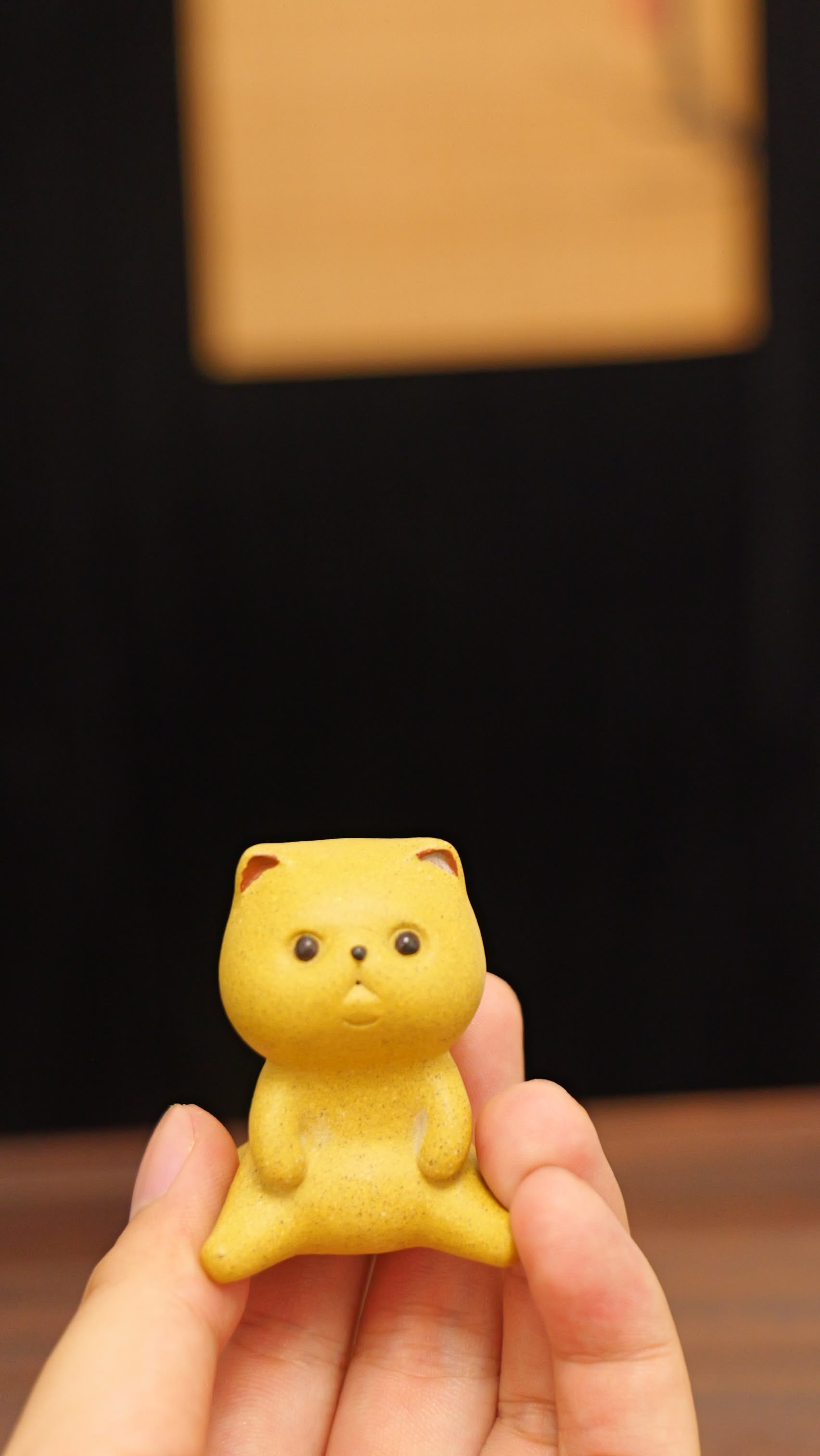 A Spaced-Out Yellow Kitten handmade pottery figurine decor (tea pet) made by yixing purple clay