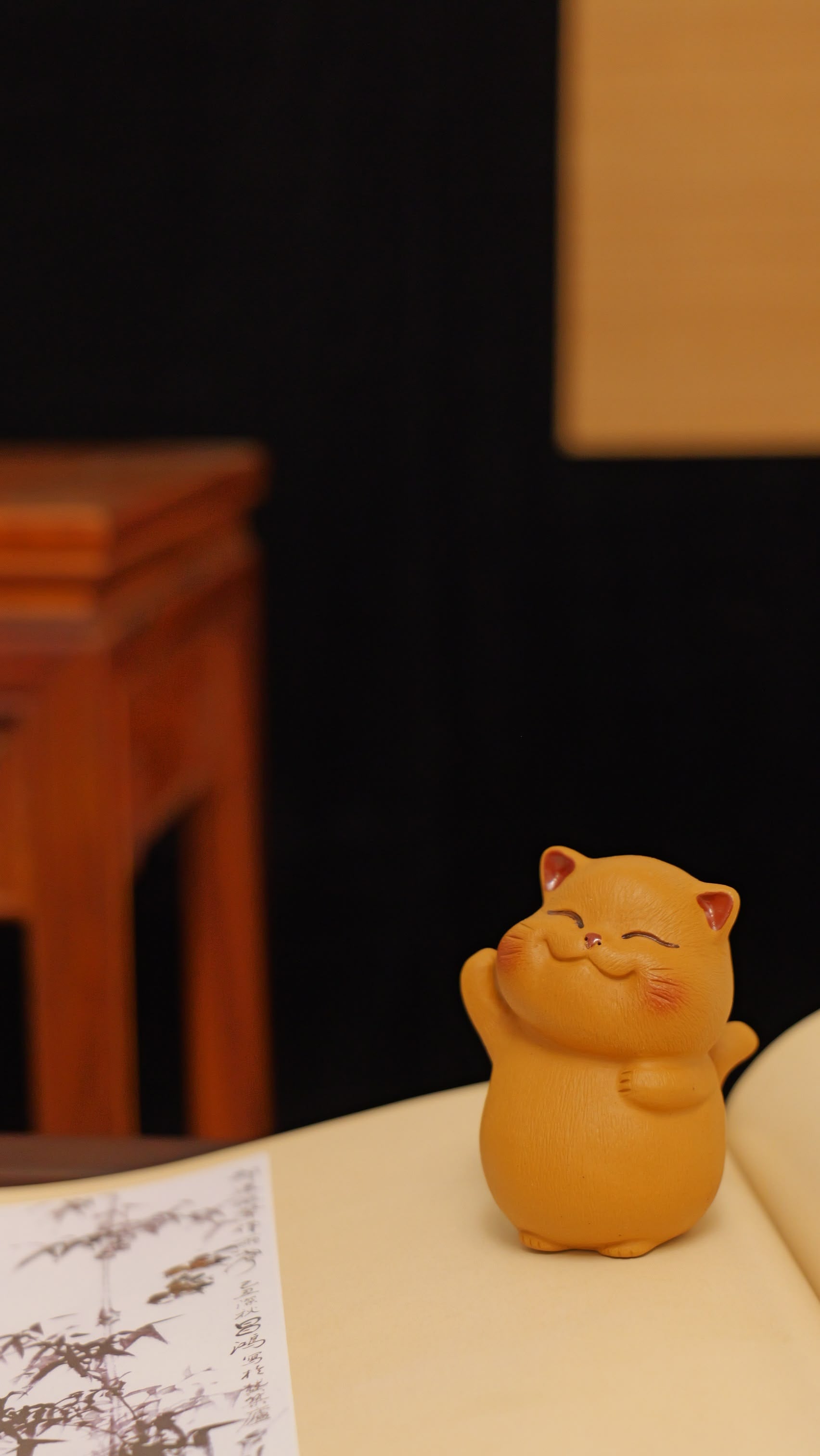 A cheerful yellow kitten handmade pottery figurine decor (tea pet) made by yixing purple clay