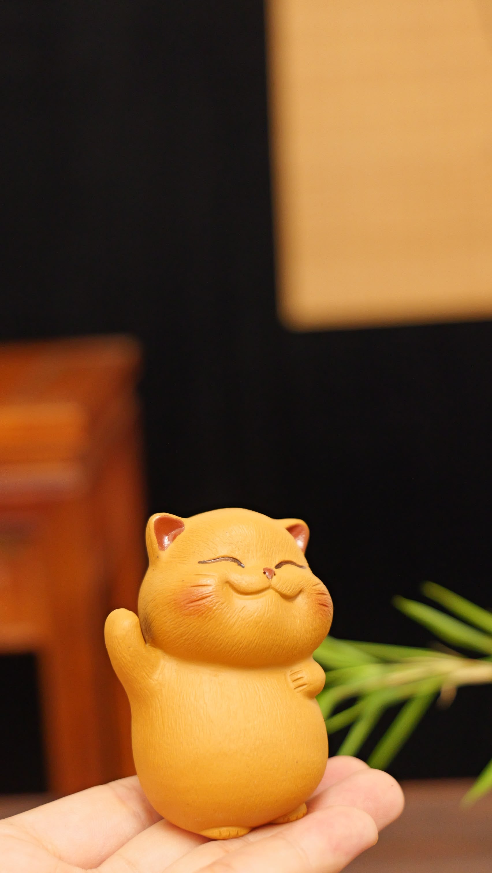 A cheerful yellow kitten handmade pottery figurine decor (tea pet) made by yixing purple clay