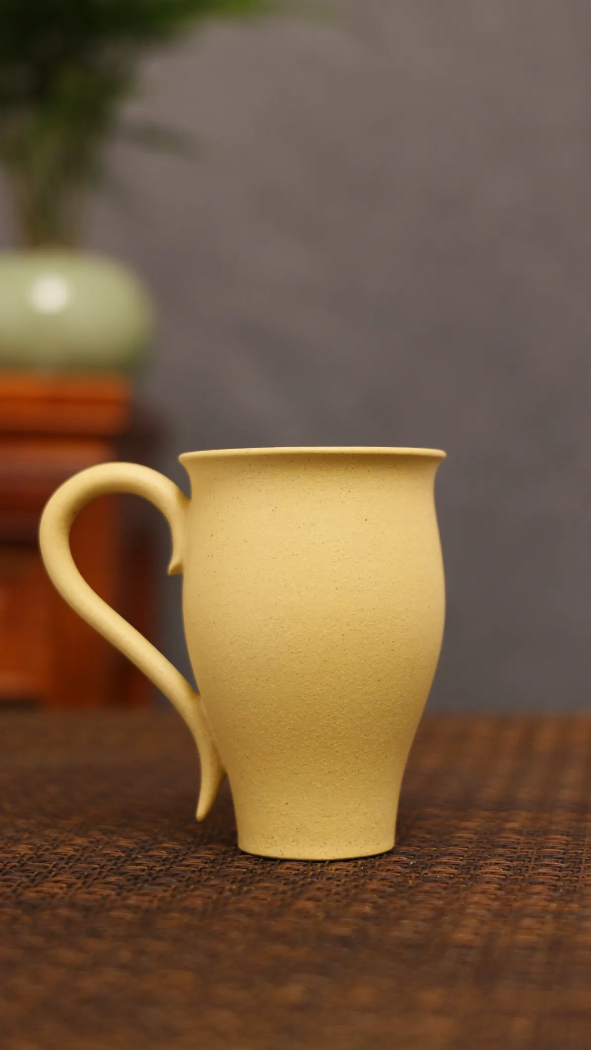 Whispering Orchid: Yixing Zisha Teacup with Butterfly Embrace