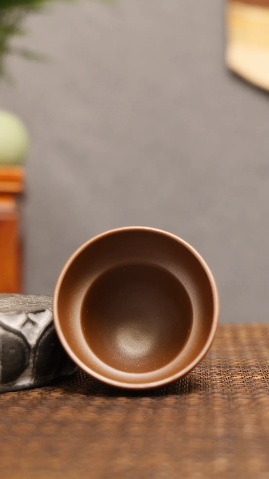 Golden Harvest: Yixing Zisha Teacup with Gourd Vine Motif