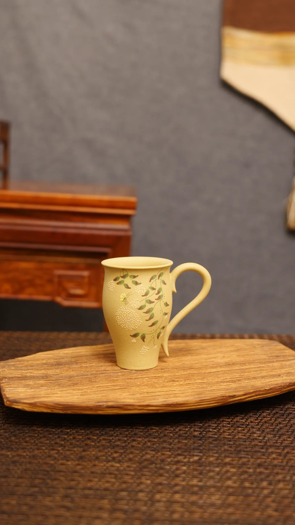 Whispering Orchid: Yixing Zisha Teacup with Butterfly Embrace