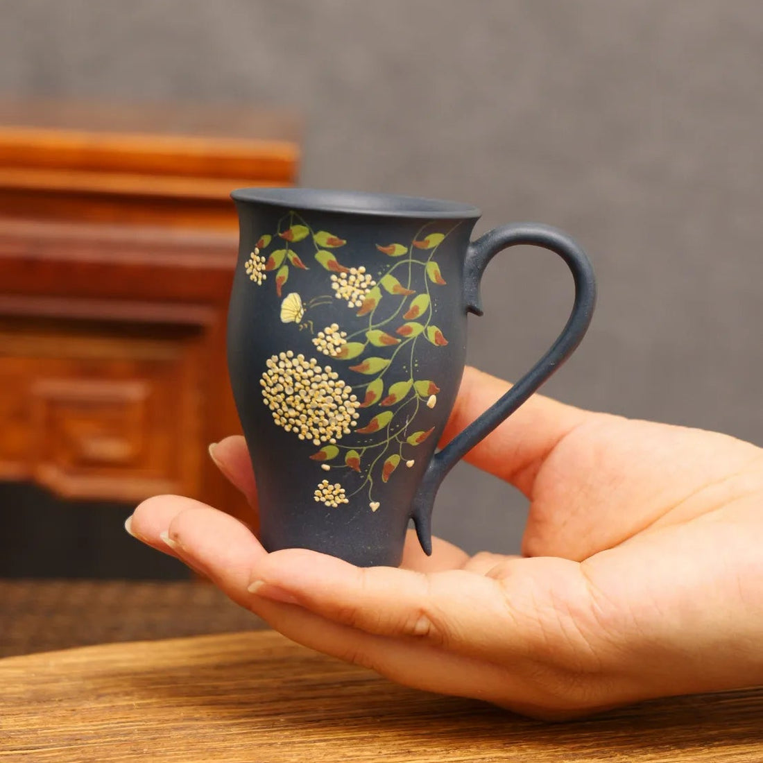 Eternal Blossom: Yixing Zisha Teacup with Butterfly Dance