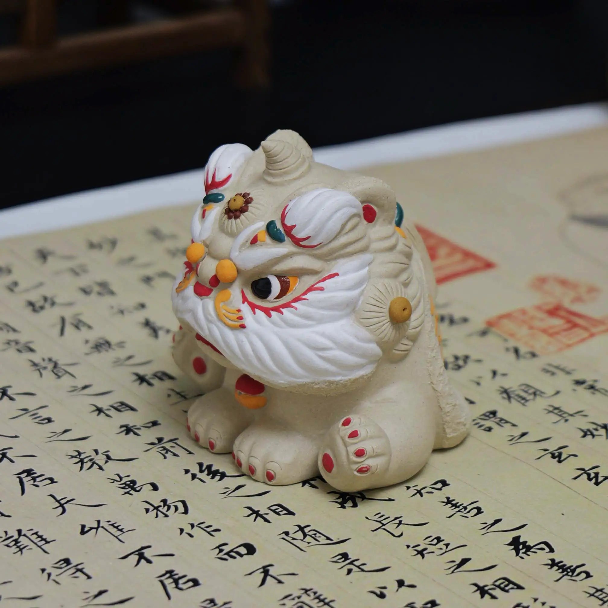 Yixing Zisha White Clay Sitting Guardian Lion Tea Pet