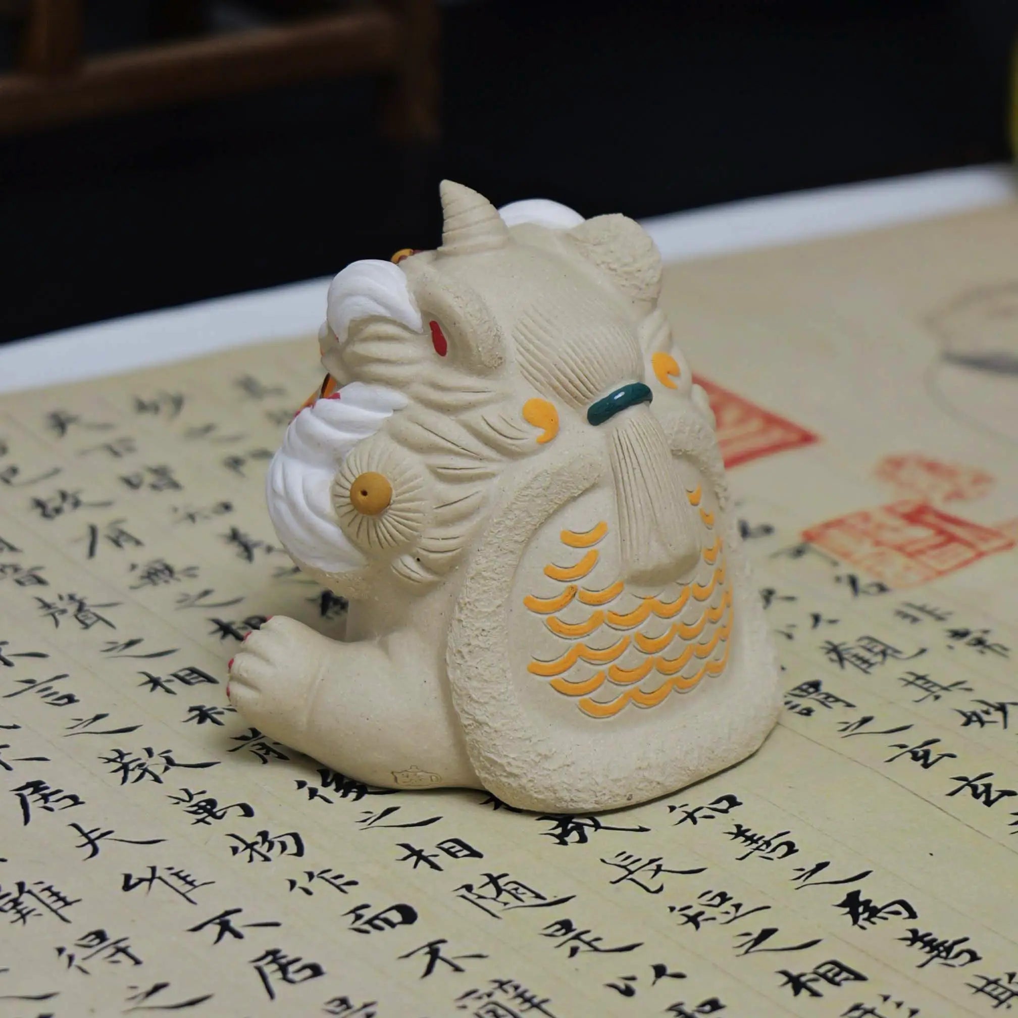 Yixing Zisha White Clay Sitting Guardian Lion Tea Pet