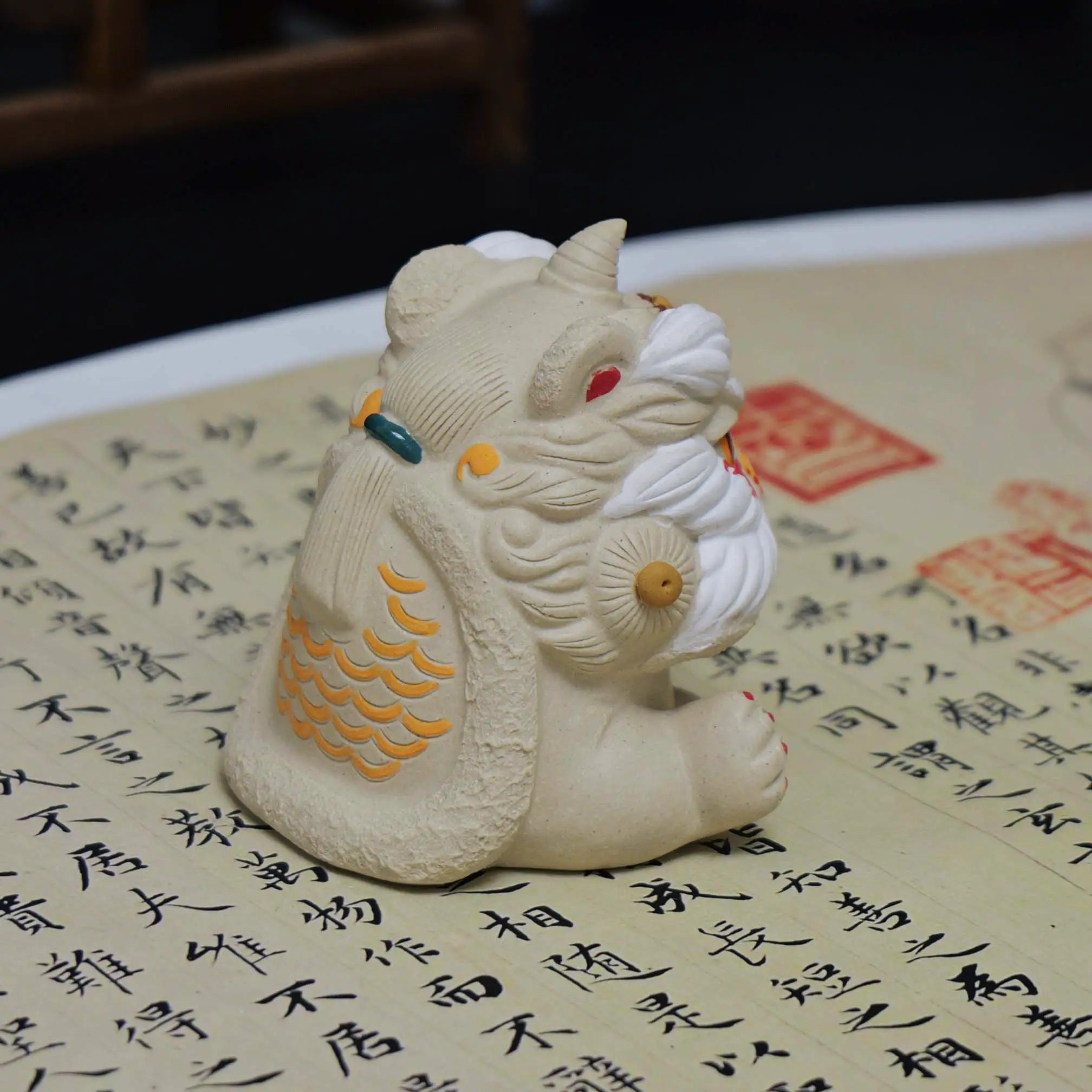 Yixing Zisha White Clay Sitting Guardian Lion Tea Pet