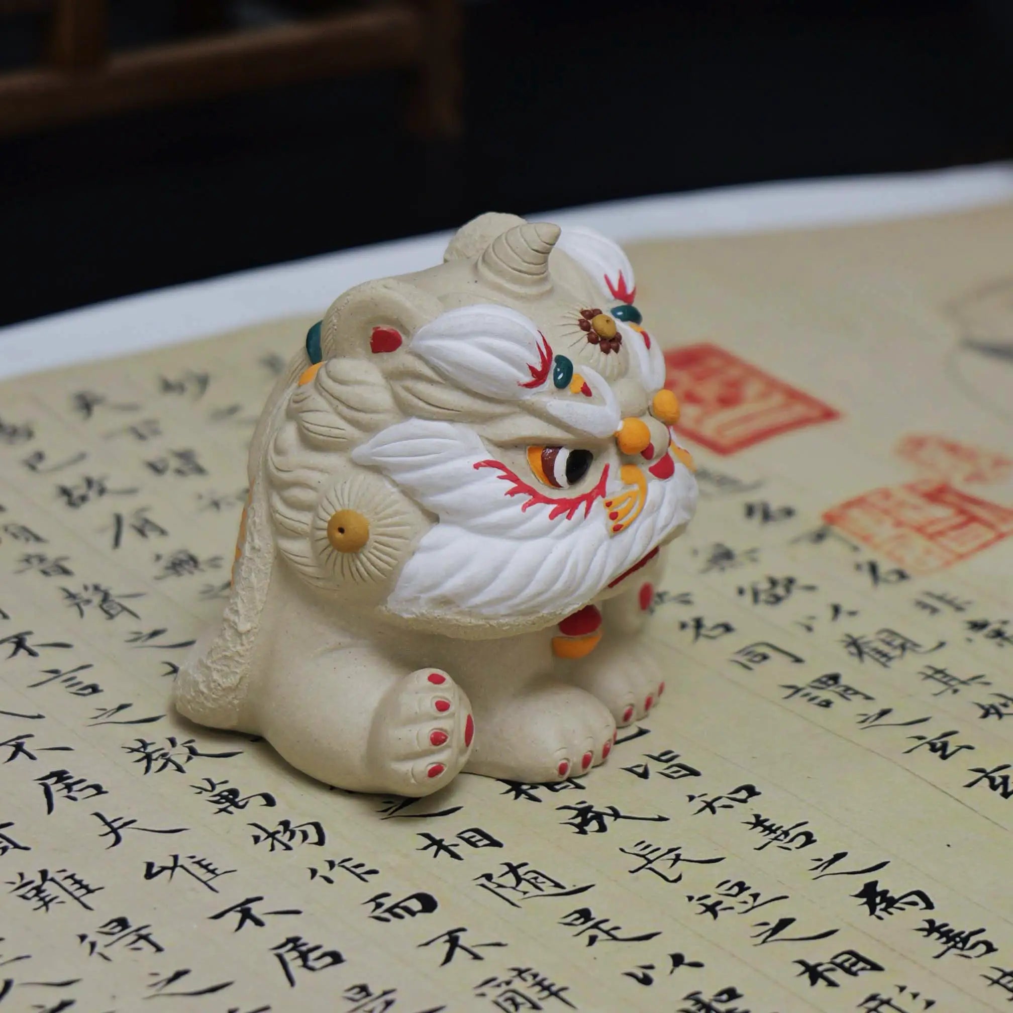 Yixing Zisha White Clay Sitting Guardian Lion Tea Pet