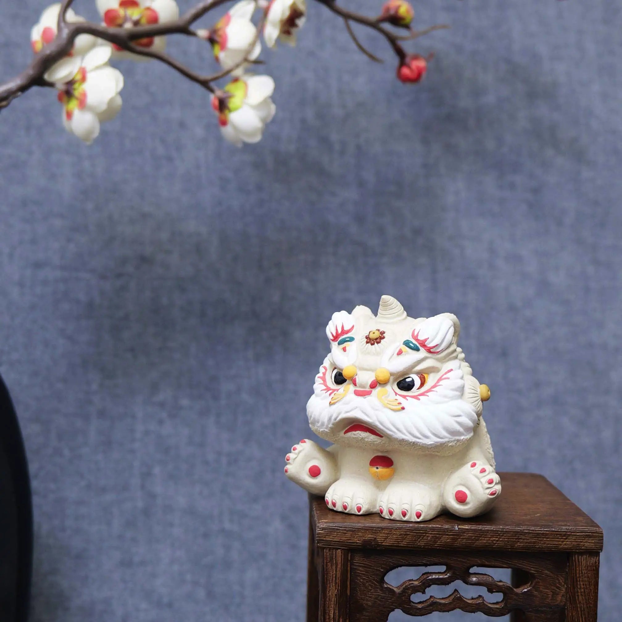 Yixing Zisha White Clay Sitting Guardian Lion Tea Pet