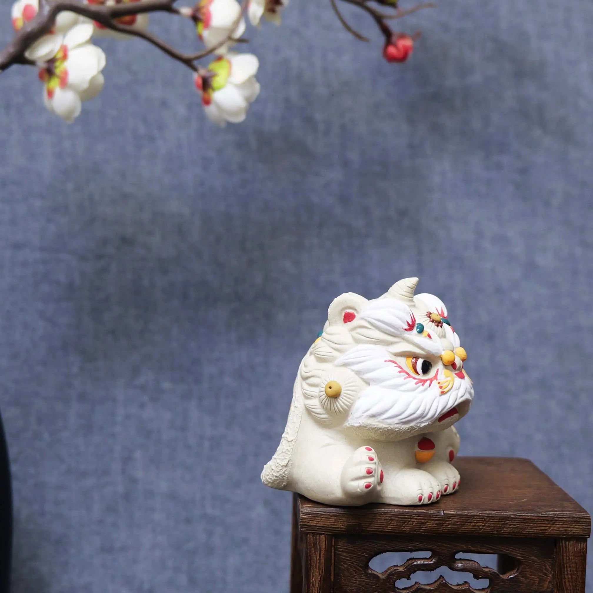 Yixing Zisha White Clay Sitting Guardian Lion Tea Pet