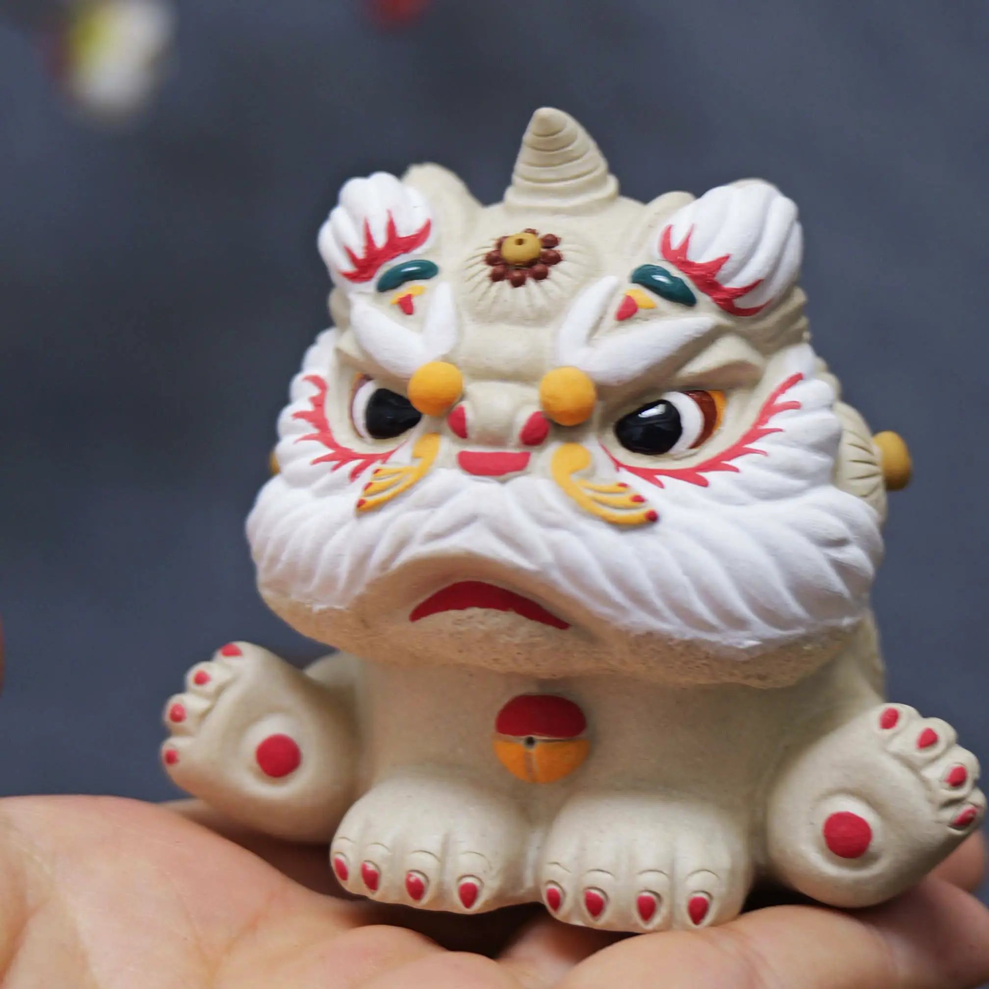 Yixing Zisha White Clay Sitting Guardian Lion Tea Pet