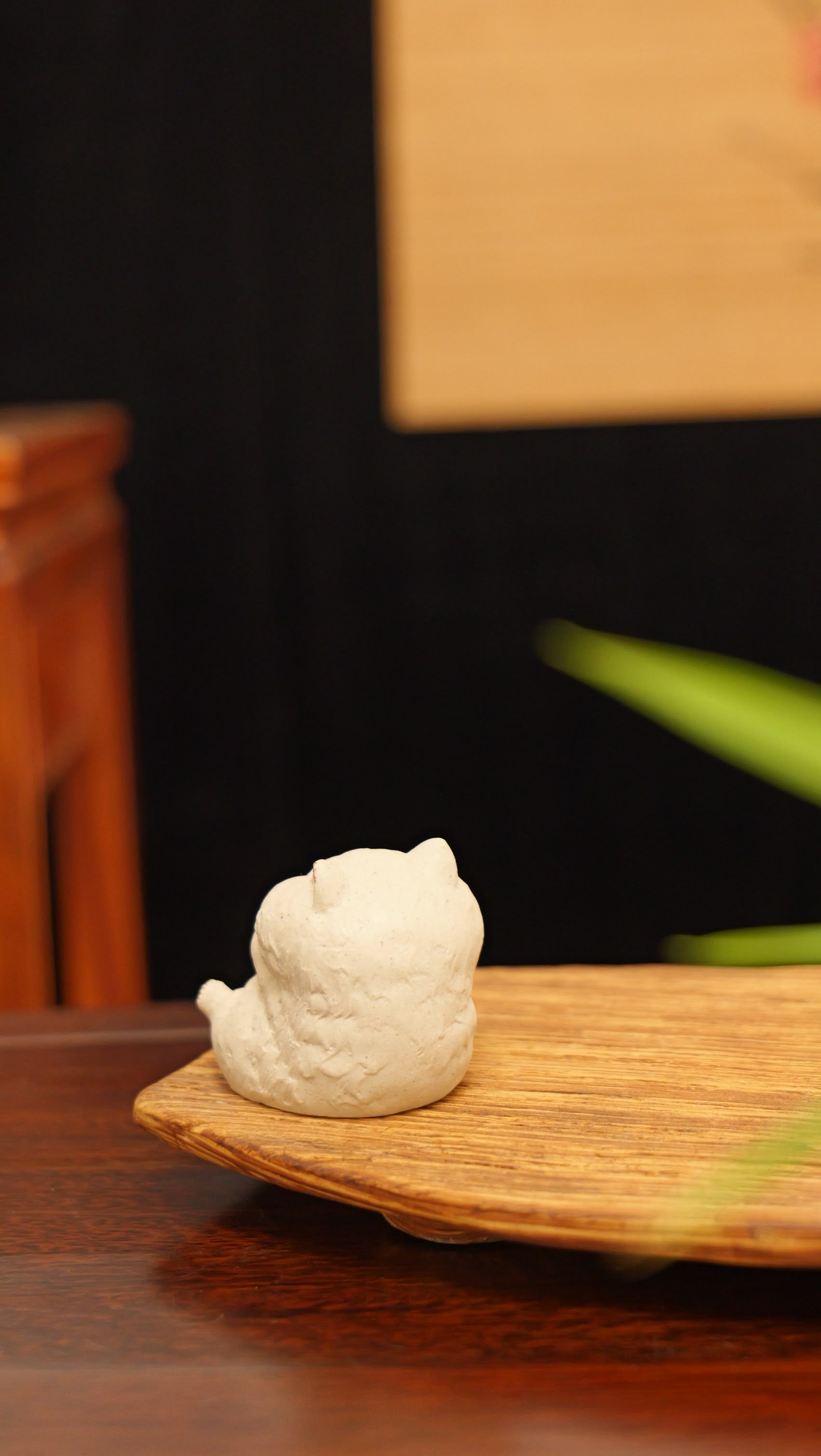 white cat holding gold handmade pottery figurine decor (tea pet) made by yixing purple clay