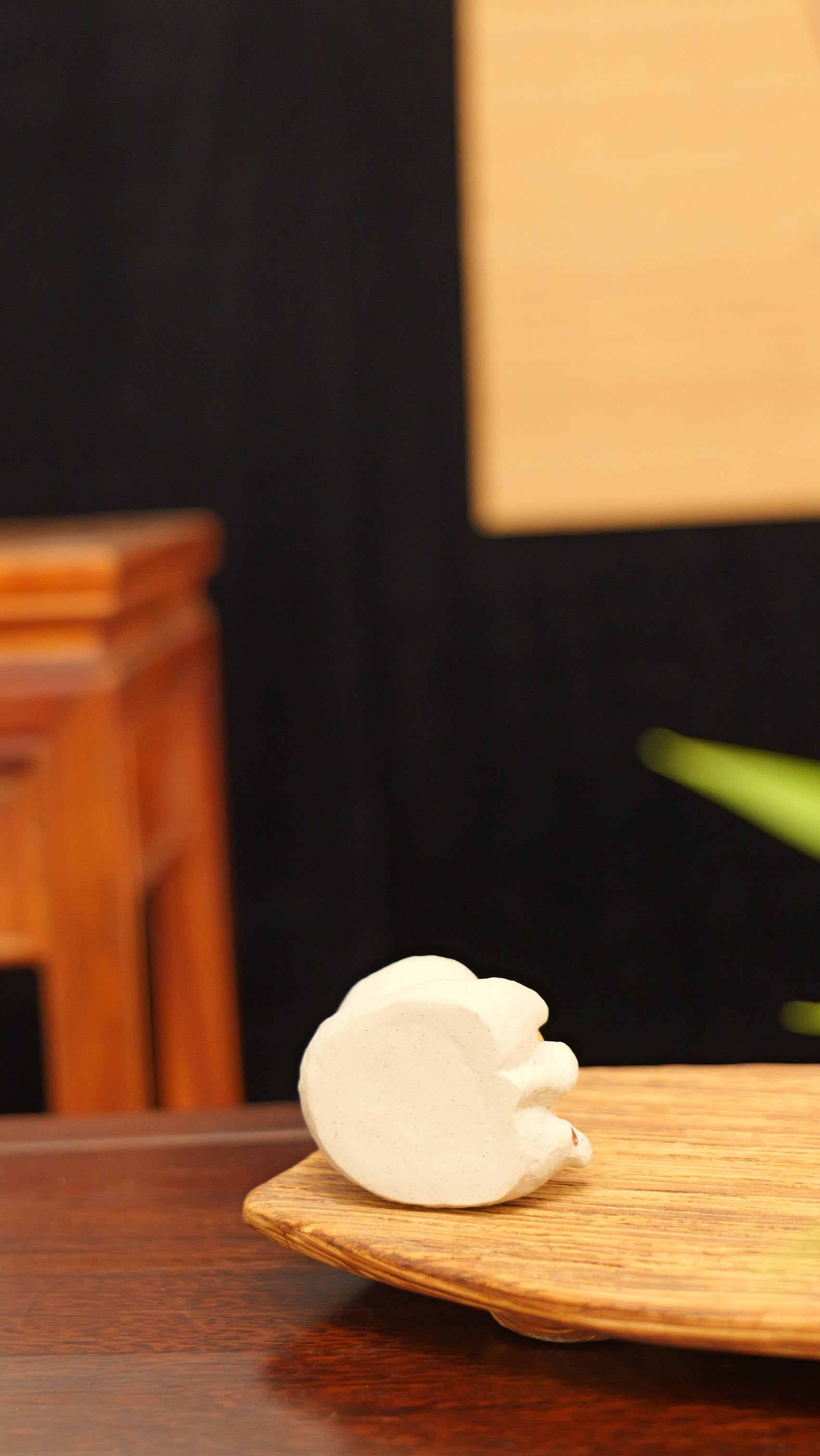 white cat holding gold handmade pottery figurine decor (tea pet) made by yixing purple clay